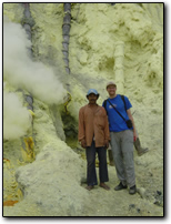 Miner with billowing, deadly sulfur vents, Kawah Ijen